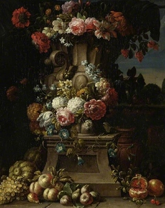 A vase of flowers with fruit in a landscape