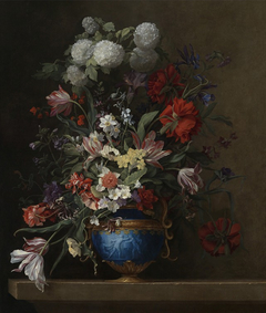 Flowers in a blue vase with a gilt mount