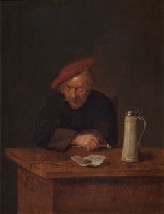 Man at a table with a pie and a tankard by Quirijn van Brekelenkam
