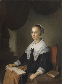 Portrait of a Lady, Seated with a Music Book on Her Lap
