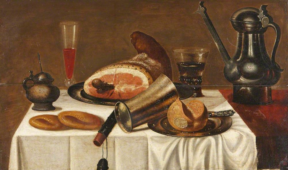 Still Life with Food and Drink on a White Tablecloth