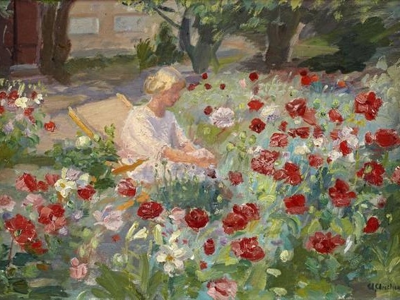 Young woman among poppies