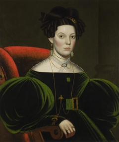 An Unidentified Lady Wearing a Green Dress with Jewelry