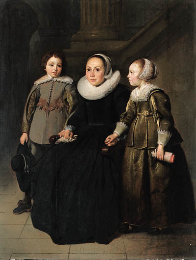 Portrait of a seated woman and two children