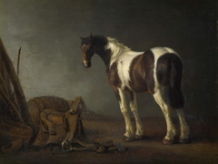 A Horse with a Saddle Beside it by Abraham van Calraet