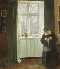 Interior with the artist's wife sowing at the window.