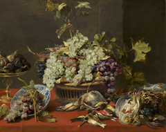 Still Life with Grapes and Game by Frans Snyders