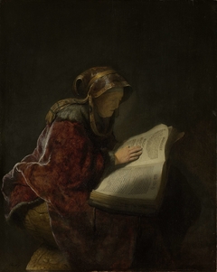 An Old Woman Reading, Probably the Prophetess Hannah by Rembrandt
