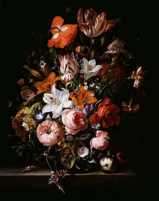Flowers in a glass vase on a marble table
