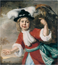 Portrait of a young boy with a falcon