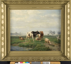 Rivierlandschap met schapen en koeien by Hendrik Savrij