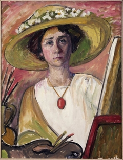 Self-Portrait in front of an easel by Gabriele Münter