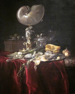 Still life with fish, bread, and a nautilus cup
