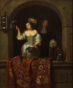 A Lady with a Parrot and a Gentleman with a Monkey by Caspar Netscher