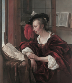 A well-dressed Lady reading
