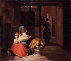 A woman with a baby on her lap and a maid seen from the back