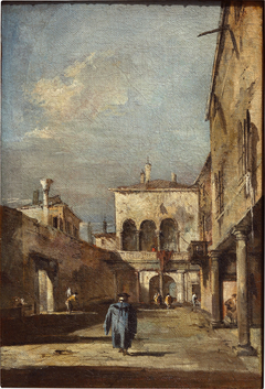 Architectural fantasy with a courtyard by Francesco Guardi