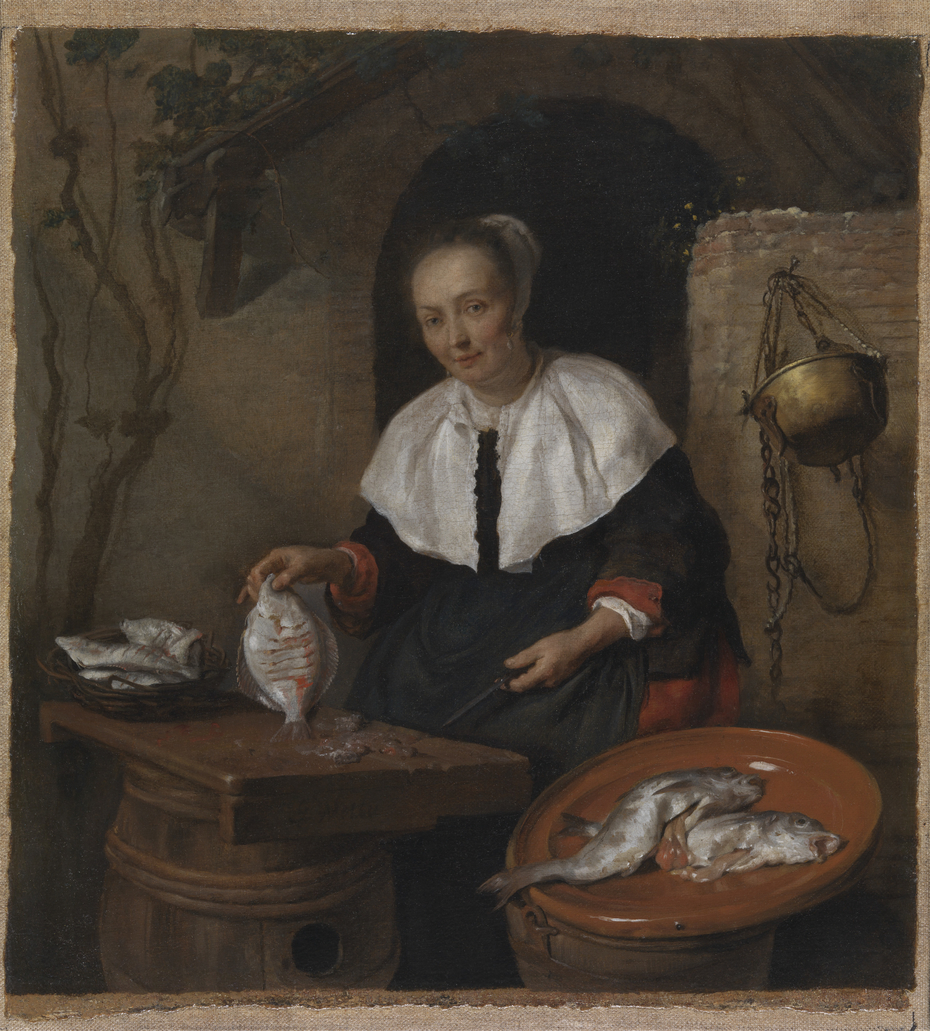 Woman cleaning fish