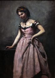 Young woman in pink dress