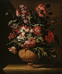 A vase of flowers by Simon Pietersz Verelst