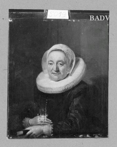 Bildnis einer älteren Frau mit weißer Haube und Radkragen by Frans Hals
