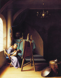 Man writing by an easel