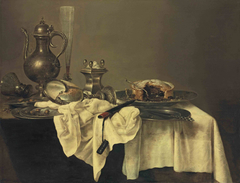 Still life with blackberry pie, nautilus cup, salt-cellar, façon- de-Venise, ewer, roemer, hazelnuts, knife and case on a partly-draped table by Willem Claesz Heda