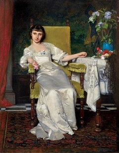 A lady with rose by Władysław Czachórski