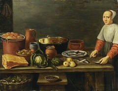 Kitchen still life with a woman cleaning a fish by Floris van Schooten