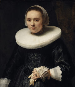 Portrait of a Lady Holding a Glove by Rembrandt