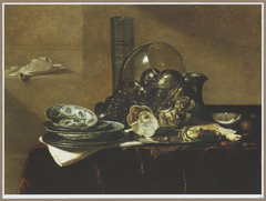 Still life with a roemer, a beer glass, a silver tazza on its side, a salt cellar and porcelain