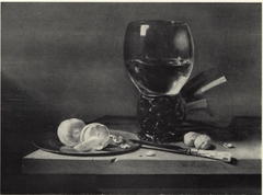 Still life with roemer, knife and lemon by Jan Olis