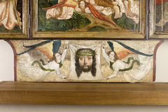 Veil of St. Veronica held by two angels. Altar retable from the church in Moszczenica Niżna – predella. by Anonymous