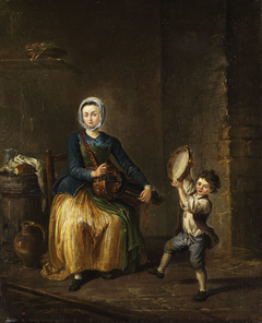 Young woman with a hurdy gurdy and a child with tambourine