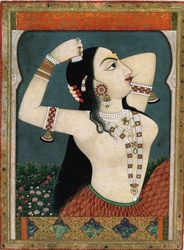 A lady combing her hair