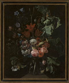 Flowers in a glass vase by Jacob van Walscapelle