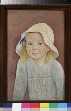 Little girl in a white hat