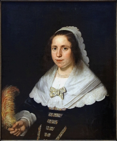 Portrait of a Woman holding a Feather