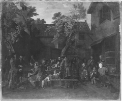 Social gathering in the inn courtyard