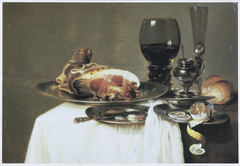 Still life with ham, knife, bowl of olives, bread, mustard pot, lemon, roemer and glass flute