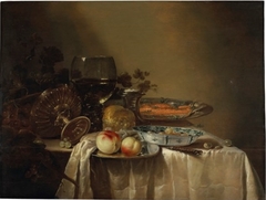 Still life with tazza, rummer, and kraak porcelain holding salmon and fruit