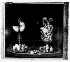 Stilleven met nautilusschelp, glas, gedecoreerde kan en schalen met fruit en noten by Georg Hainz