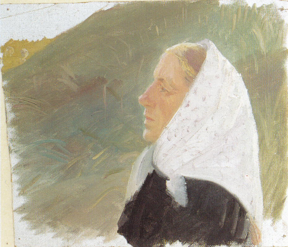Young woman in black with a white headscarff, sitting in the dunes