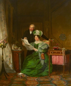 A Lady and a Gentleman admiring Drawings of Flowers in an Interior by Alexander Mosses