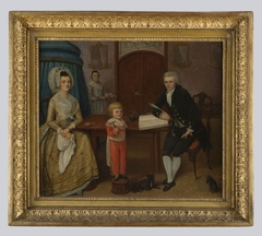 Familieportret, man, vrouw en kind in interieur by Hendricus Johan Antonius Baur