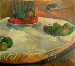 Fruit on a Table with a Small Dog