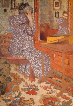 Madame Vuillard Arranging her Hair by Édouard Vuillard