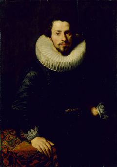 Portrait of a Man at a Table