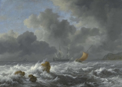 Sailing vessels in a stormy sea near a rocky coast