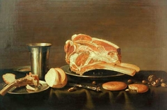 Still life with cut of beef, chalice and bread